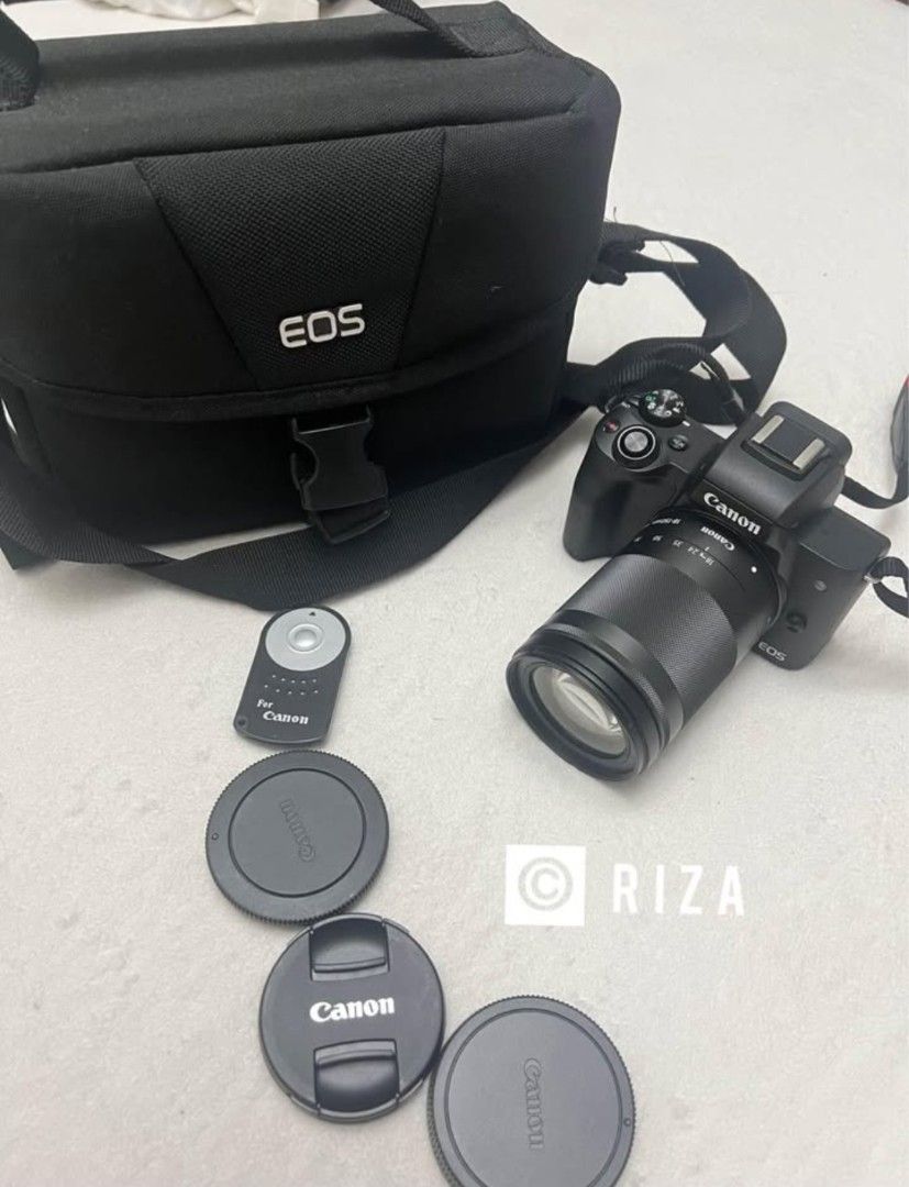 Canon EOS M50 Mirrorless Camera with 18-150mm Lens & Bag (Category: Cameras) located in Manila. Submitted by raeezzza (Listing ID 1453475254, Image 2). Description: - Canon EOS M50 Camera - Versatile 18-150mm Lens - Includes Camera Bag - Remote Shutter Included - Comes with Lens Caps - Tripod Included - Ideal for both Photos and Videos - Ready for your next adventure!.