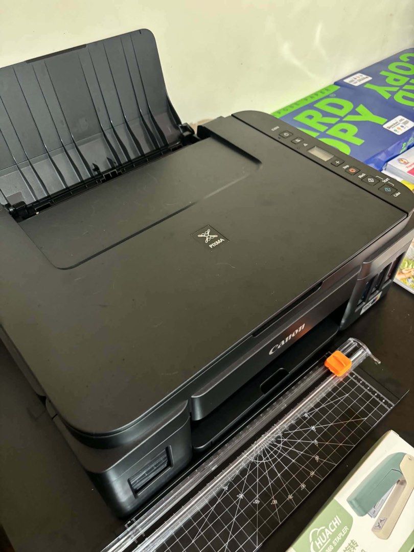 Canon PIXMA G3000 Printer with Office Supplies (Category: Printers, Scanners & Copiers) located in General Trias. Submitted by mrssigua (Listing ID 1453547362, Image 3). Description: - Canon PIXMA G3000 Printer - Huachi Stapler - Paper Cutter - Hole Punch - Tweezers - Sticker Paper - Glossy Photo Paper - Multi-purpose Paper - Perfect for home or office use.