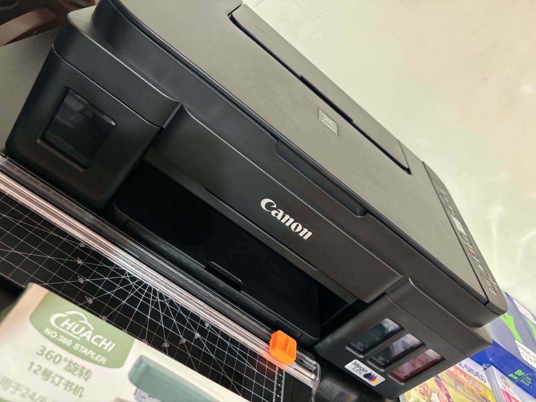 Canon PIXMA G3000 Printer with Office Supplies (Category: Printers, Scanners & Copiers) located in General Trias. Submitted by mrssigua (Listing ID 1453547362, Image 1). Description: - Canon PIXMA G3000 Printer - Huachi Stapler - Paper Cutter - Hole Punch - Tweezers - Sticker Paper - Glossy Photo Paper - Multi-purpose Paper - Perfect for home or office use.