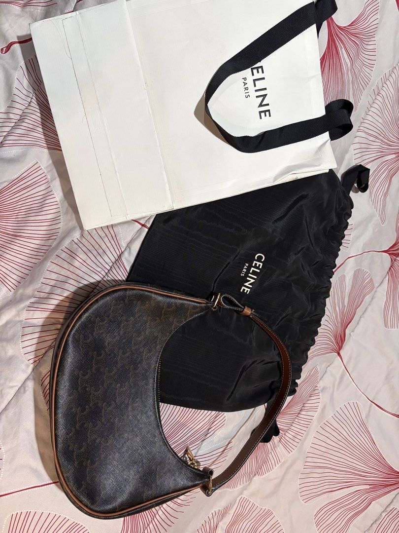 CELINE Triomphe Canvas Ava Bag (Category: Luxury Bags & Wallets) located in Quezon City. Submitted by tiffanyong87 (Listing ID 1453534226, Image 1). Description: - Authentic Celine Triomphe iCanvas Ava bag - Comes with original dust bag and shopping bag - Classic brown and tan monogram print - Genuine leather trim and strap - Secure zipper closure - Ideal stylish everyday bag.