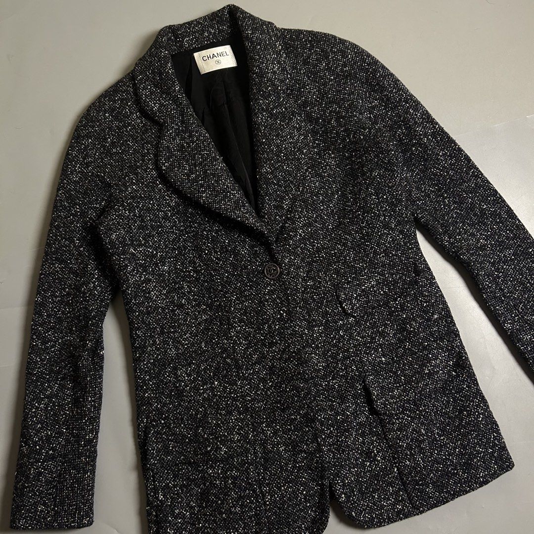 Chanel black and white speckled tweed jacket (Category: Luxury Apparel) located in Cebu City. Submitted by streetguruthrift (Listing ID 1453617645, Image 2). Description: Chanel black and white speckled tweed jacket -This single-breasted classic blazer features a notched lapel, structured shoulders, functional lower flap pockets, and a signature interlocking CC logo button at the front closure. The interior is finished with a luxury silk lining a