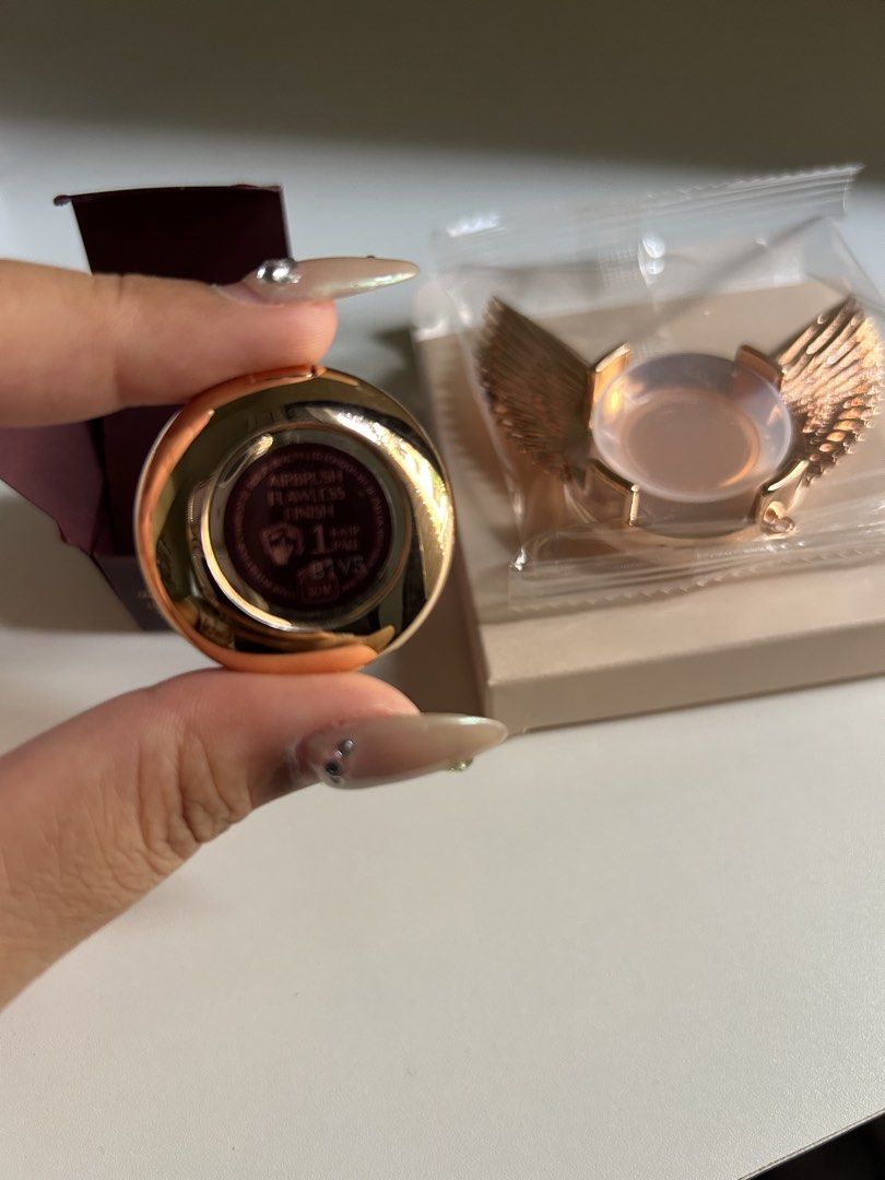 Charlotte Tilbury Pop Socket Powder Set (Category: Makeup) located in Taguig. Submitted by janelly_ace (Listing ID 1453466358, Image 3). Description: - Charlotte Tilbury Airbrush Flawless Finish Powder with Pop Socket set - Shade: 1 Fair - Includes original box and packaging - RFS: Decluttering.