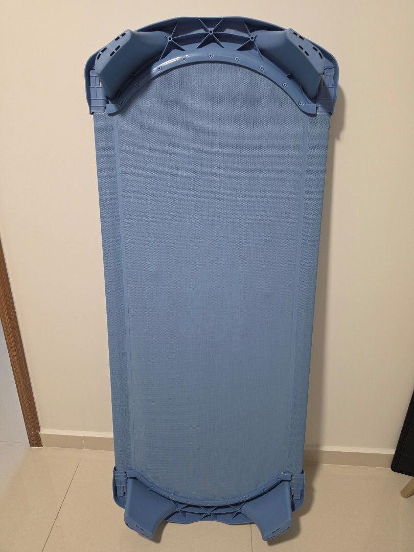 Children stackable sleeping cot (Category: Childrens' Beds) located in Singapore. Submitted by pingpongpiang_xp (Listing ID 1453467590, Image 1). Description: - Children's sleeping cot in a pleasant blue color. - Features a breathable mesh sleeping surface for comfort. - Sturdy and durable construction. - Ideal for naps, daycare. only tried once but child prefer mattress instead. self collect at tampines.
