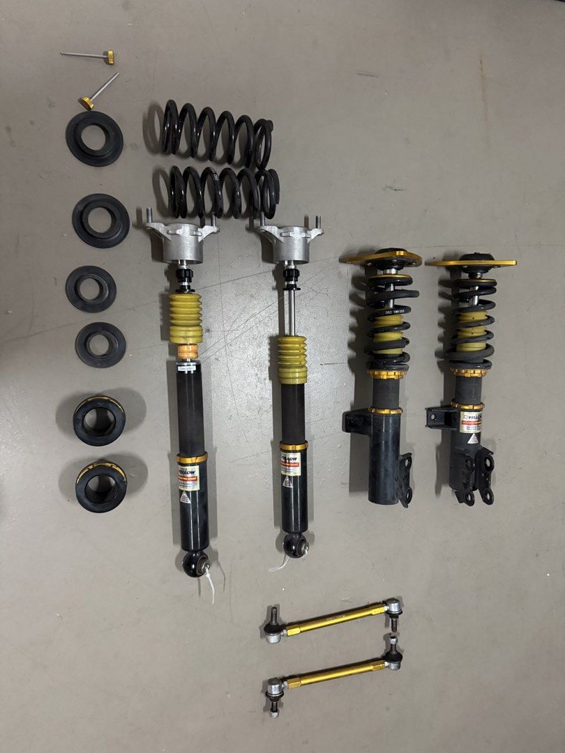 CLA coilover (Category: Suspension & Handling) located in Singapore. Submitted by plop_pup (Listing ID 1453581201, Image 2). Description: Used for 7 months only. Installed in Jan ‘26 Yellow sport racing dynamic sport pro. Bought brand new. Dekitted off car already. Cash and carry. Rear has a very minor noise. No leaks( confirmed by mechanic. Please consult your own mechanic if can fit your vehicle. Price is fixed. Adjustable hide and ride dampeni