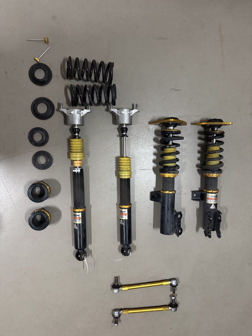 CLA coilover (Category: Suspension & Handling) located in Singapore. Submitted by plop_pup (Listing ID 1453581201, Image 3). Description: Used for 7 months only. Installed in Jan ‘26 Yellow sport racing dynamic sport pro. Bought brand new. Dekitted off car already. Cash and carry. Rear has a very minor noise. No leaks( confirmed by mechanic. Please consult your own mechanic if can fit your vehicle. Price is fixed. Adjustable hide and ride dampeni