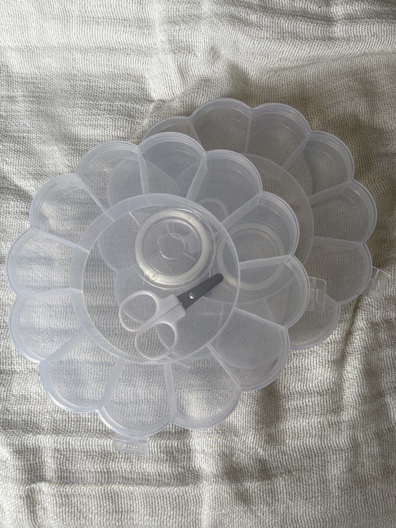 Clear Flower Shape Compartment Organizer with Scissors and Beads Thread (CAN ADD BEADS UPON REQUEST) (Category: Craft Supplies & Tools) located in Manila. Submitted by prima_onda (Listing ID 1453475096, Image 1). Description: - Adorable flower-shaped clear plastic organizers. - Multiple compartments for easy organization. - Each organizer includes a small pair of white scissors and a roll of clear tape. - Ideal for storing small craft supplies, b