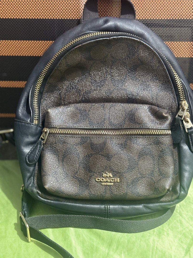 Coach 2017 Charlie Mini Backpack in Signature Canvas. (Category: Backpacks) located in Imus. Submitted by timelessfindph (Listing ID 1453544115, Image 1). Description: 2017 Coach Charlie Mini Backpack in Signature Canvas. Orig Bag only No cert or docs Issue yung sa din 2nd pic yun lang, pero di halata dahil sa color Nya.