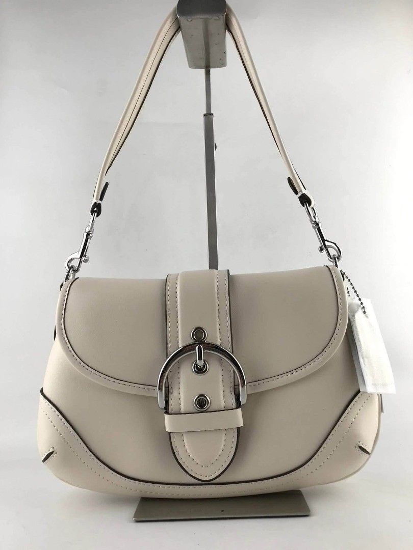 Coach Soho Shoulder Bag in Chalk (Category: Shoulder Bags) located in Quezon City. Submitted by bagsboutiqueph (Listing ID 1453584162, Image 1). Description: LAST PRICE POSTED. LIMITED STOCKS! BRANDNEW WITH INCLUSIONS. COLOR MAY SLIGHTLY VARY IN ACTUAL DUE TO LIGHTING AND CAMERA SETTING. OTHER PHOTOS WILL BE SEND DURING PURCHASE AND FOR SURE BUYERS ONLY. WHEN IN DOUBT, DO NOT ORDER. THANK YOU..