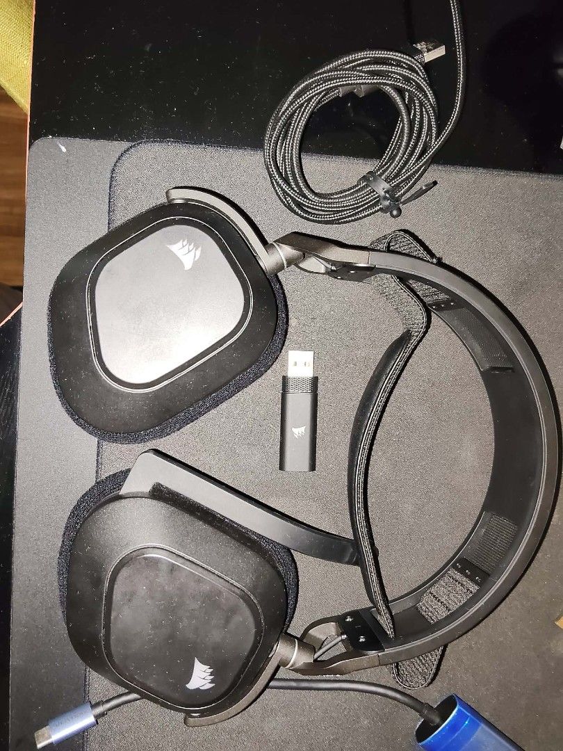 Corsair Wireless Gaming Headset with USB Dongle HS80 (Category: Headphones & Headsets) located in Manila. Submitted by emitakerus08386 (Listing ID 1453587331, Image 1). Description: - Corsair wireless gaming headset - Includes headset, USB dongle, and charging cable - Perfect for gaming or listening to music - Features comfortable earcups for extended wear - Wireless connectivity for unrestricted movement - Tested and confirmed to be in working c