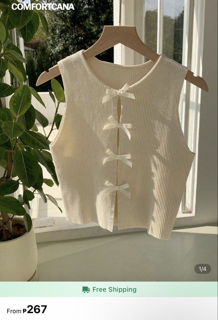 Cream Ribbed Knit Vest with Bows (Category: Sleeveless) located in Pasig City. Submitted by ___an.j (Listing ID 1453548650, Image 1). Description: Worn once only.