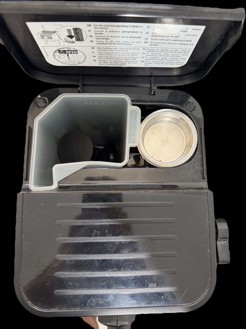 DeLonghi Espresso Machine with Steam Wand (Category: Coffee Machines & Makers) located in Tarlac. Submitted by flourishingrace (Listing ID 1453615325, Image 3). Description: - Black DeLonghi espresso machine - With box (just found it for previous inquiries) - Used not more than 5 times, tapos natambak nalang. - Built-in steam wand not working - Comes with 2 baskets (single and double shot) - Perfect for homemade coffee drinks.