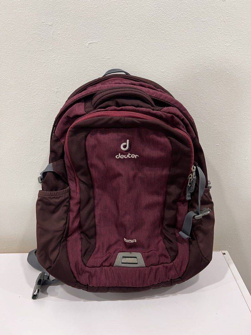 Deuter giga backpack (Category: Backpacks) located in Manila. Submitted by threadtressure (Listing ID 1453582820, Image 1). Description: Deuter giga backpack dark violet. All zippers functioning well. Water repellent, great if you have a lot of papers of gadgets. RFS: No longer using Condition: 9.5/10 No issues.