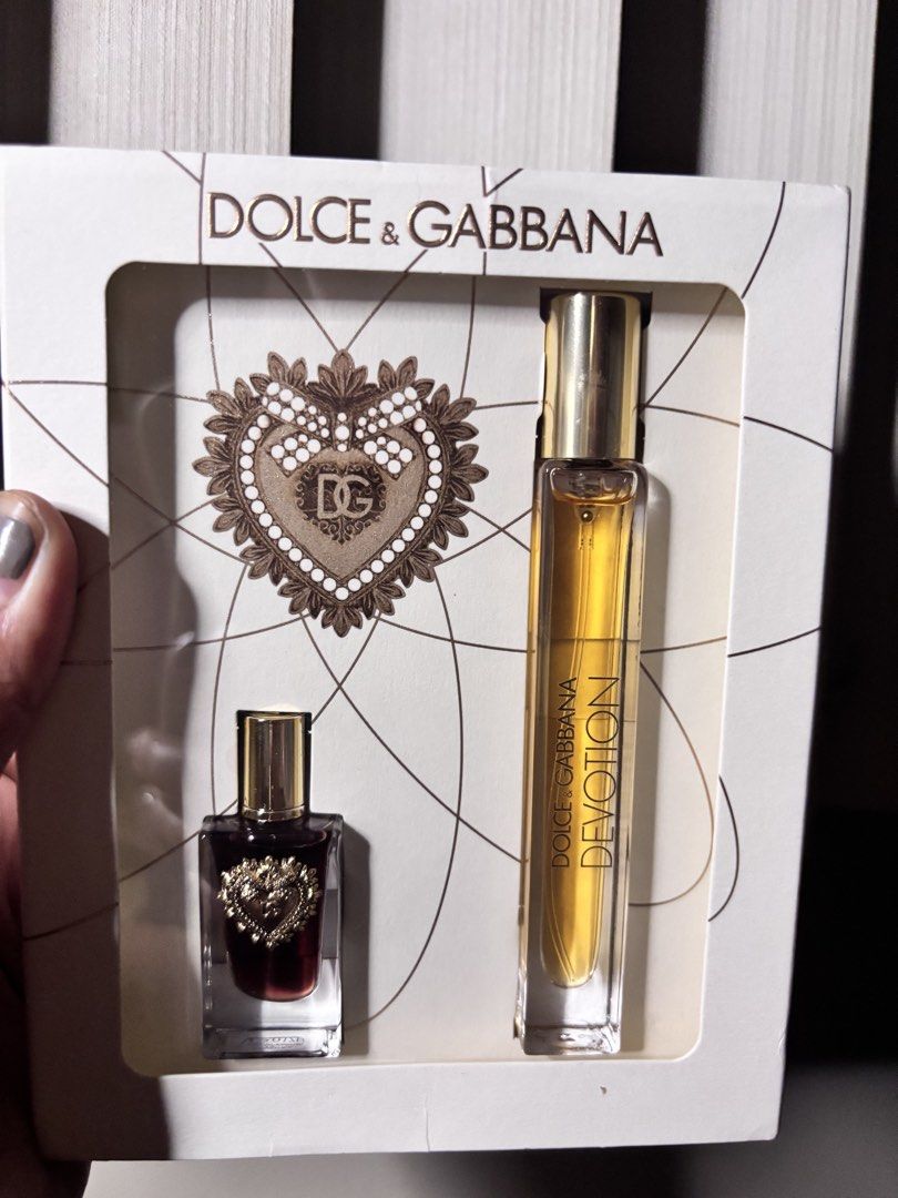 Dolce & Gabbana | Devotion Eau De Parfum | New (Category: Fragrance & Deodorants) located in Mandaluyong City. Submitted by myclosettours (Listing ID 1453610015, Image 2). Description: Disclaimer: Used about 5 sprays. See image for actual liquid content. This is the Dolce&Gabbana Devotion Eau de Perfum mini travel set. It features a bright, warm floral gourmand scent profile inspired by Italian panettone. Top Note: Candied LemonHeart Notes: Orang