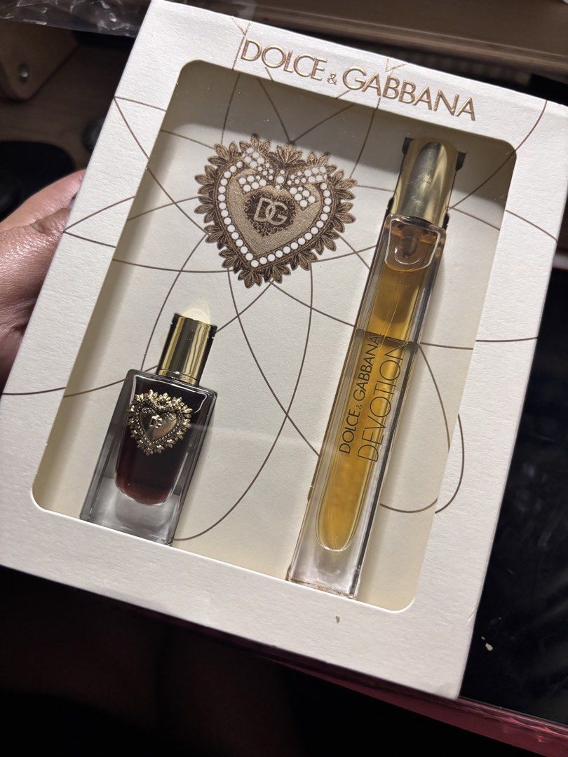 Dolce & Gabbana | Devotion Eau De Parfum | New (Category: Fragrance & Deodorants) located in Mandaluyong City. Submitted by myclosettours (Listing ID 1453610015, Image 1). Description: Disclaimer: Used about 5 sprays. See image for actual liquid content. This is the Dolce&Gabbana Devotion Eau de Perfum mini travel set. It features a bright, warm floral gourmand scent profile inspired by Italian panettone. Top Note: Candied LemonHeart Notes: Orang