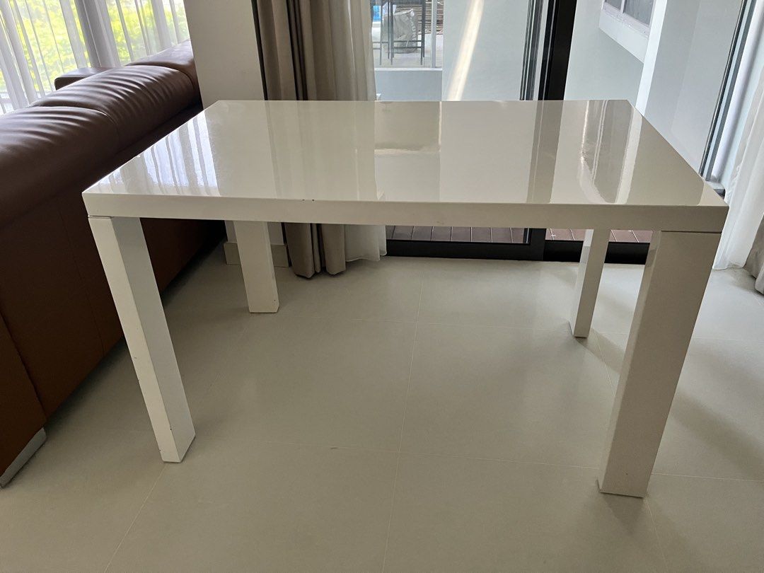 Dining table (Category: Tables & Sets) located in Singapore. Submitted by bunnyyong (Listing ID 1453480912, Image 1). Description: 120cm White dining table Some defect - see pictures Free. Not for fussy. Self collection at Joo Chiat Lane Also has black dining chair for sale $5 each, $18 for 4. .