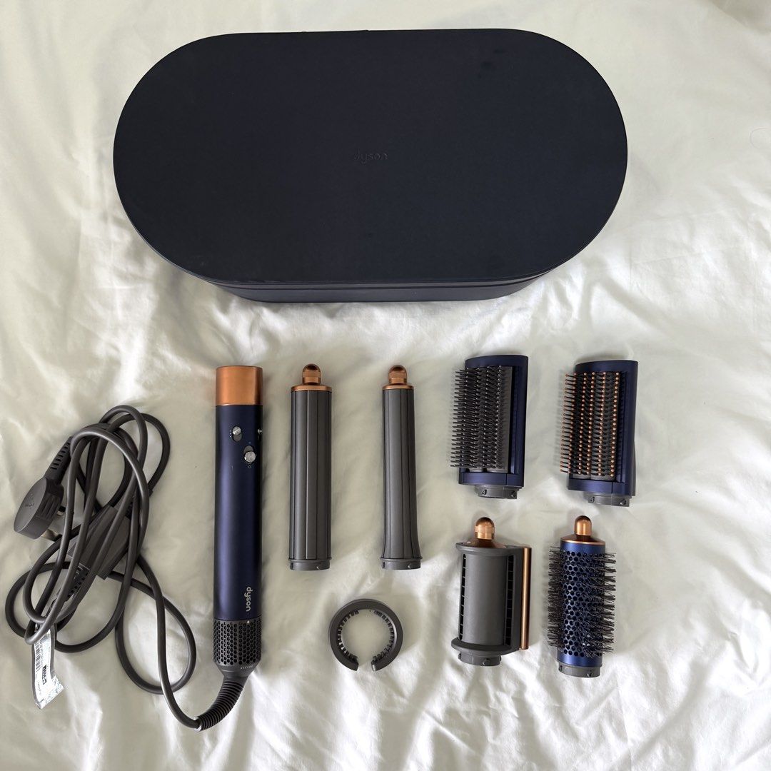 Dyson Airwrap Complete Long Multi Styler (Category: Hair) located in Manila. Submitted by averioph (Listing ID 1453466681, Image 2). Description: Dyson Airwrap Multi Styler With presentation case Includes 6 attachments and filter cleaning brush No issues 98% smooth RFS: Upgrade.