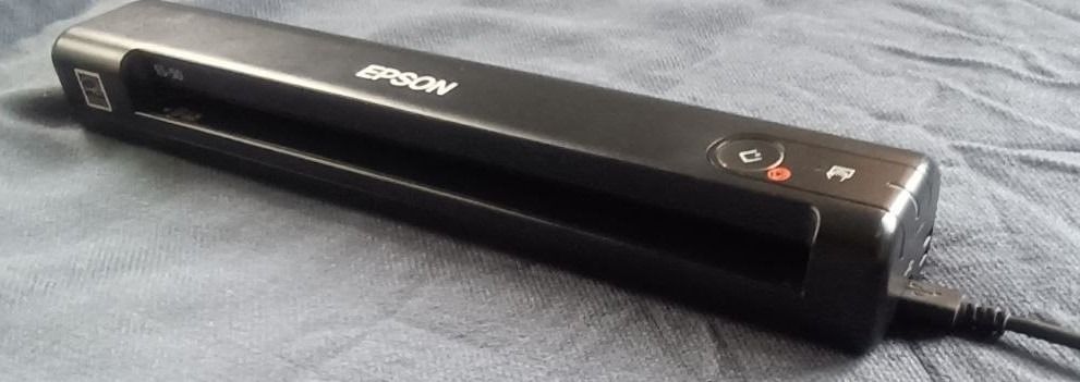 Epson WorkForce ES-50 Portable Document Scanner (Category: Printers, Scanners & Copiers) located in Davao. Submitted by scaras (Listing ID 1453592538, Image 1). Description: Epson WorkForce ES-50 Portable Document Scanner Note: > Purchased in the USA > Slightly used – Good as new > Doesn’t come with its original box * Meet-up: Dumoy (Davao City) Area Key Characteristics & Functions: • Form Factor: Features an ultra-compact, long, rectangular blac