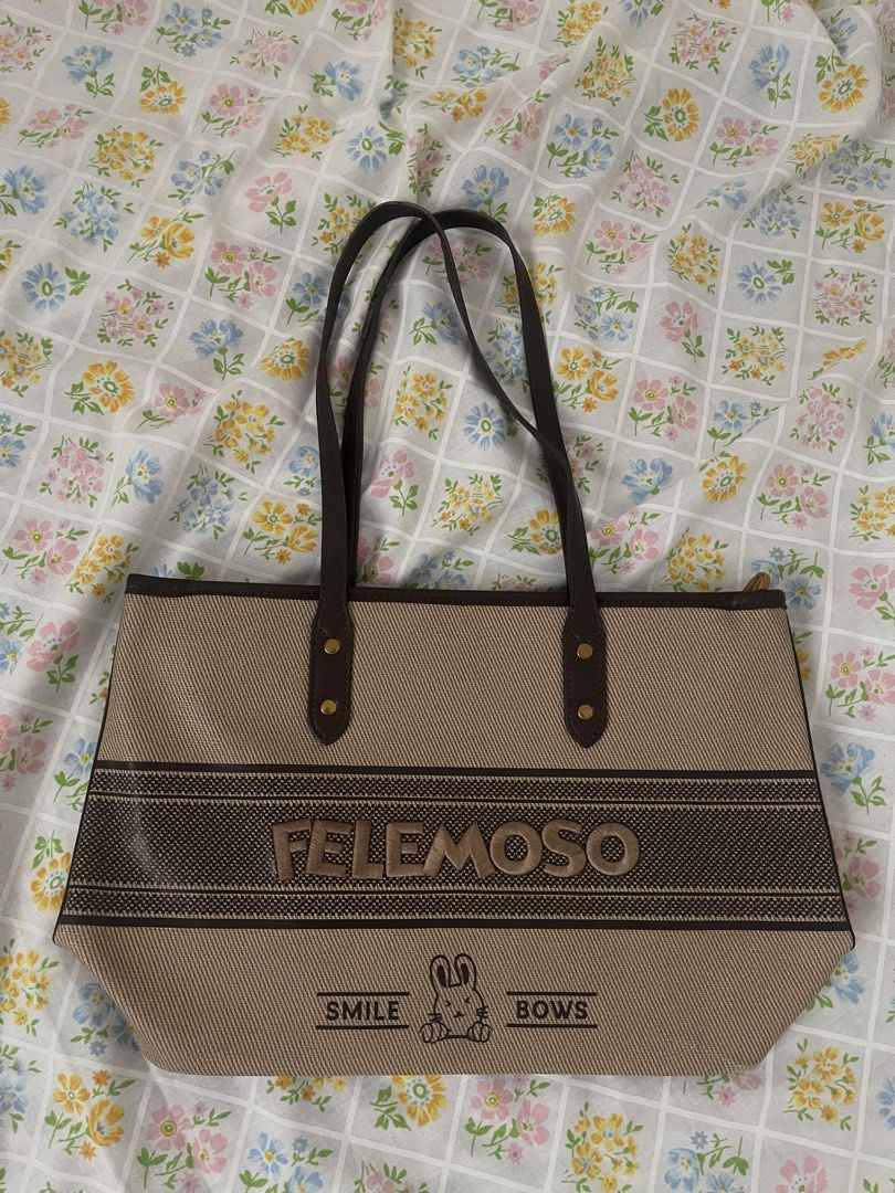 Felemoso Tote Bag (Category: Tote Bags) located in Santa Cruz, Pampanga. Submitted by httpschayo (Listing ID 1453440063, Image 1). Description: Felemoso Shoulder Bag ₱220 — very spacious interior — gold-tone hardware — ideal for everyday use — issue: may slight scratch sa bottom corners and may minor dents sa rubber lining (see photos above for reference).