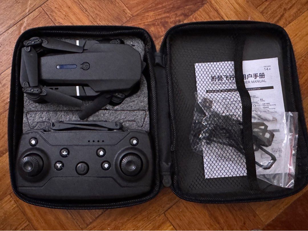 Foldable Drone with Remote Control and Case (Category: Drones) located in Pasig City. Submitted by thrifits (Listing ID 1453468647, Image 1). Description: - Foldable Drone Set - Ideal for Beginners - Includes: Drone, Remote Control, Carrying Case - Also Comes With: User Manual, Charging Cables - Ready for Flight.