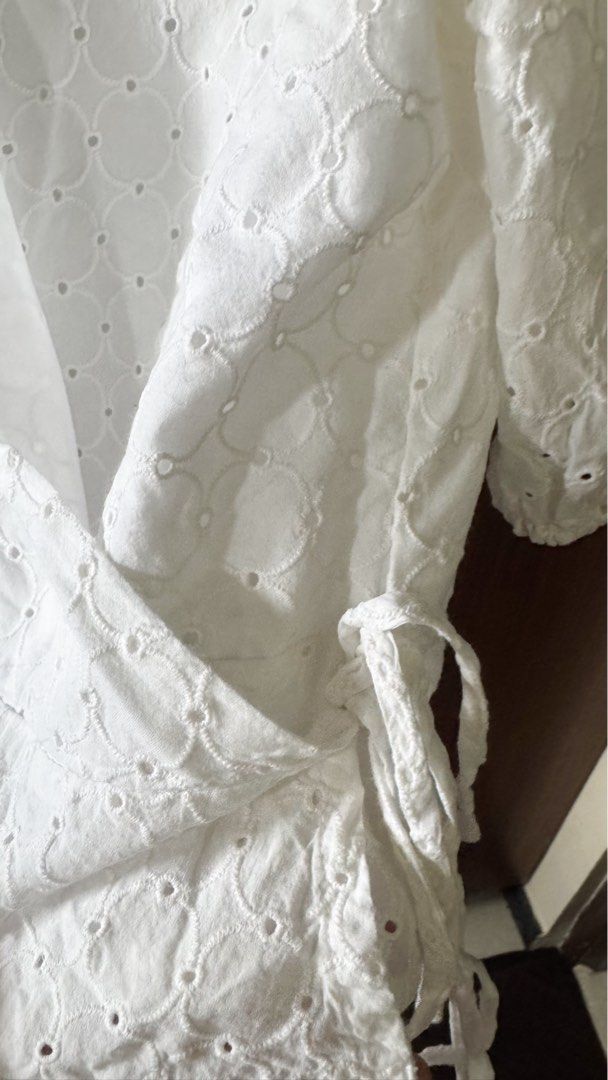 For Me White Eyelet Wrap Crop Top XS (Category: Blouses) located in Las Pinas. Submitted by crlne (Listing ID 1453519950, Image 2). Description: - Brand: For Me - Style: White eyelet wrap crop top - Features: Puff sleeves with elastic cuffs, side tie detail - Occasion: Perfect for summer, breezy - Size: Extra Small (XS).
