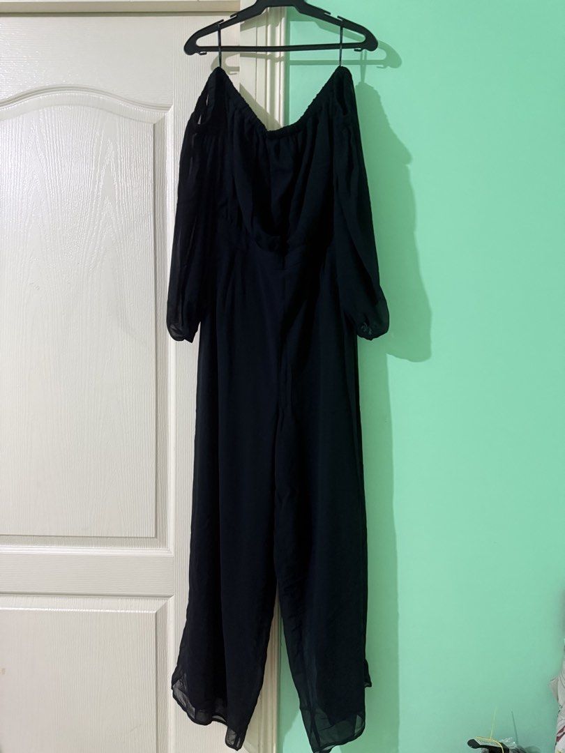 Forever 21 Black Off-Shoulder Chiffon Jumpsuit (Category: Jumpsuits) located in Manila. Submitted by ninnavanilla (Listing ID 1453585308, Image 1). Description: - Black off-shoulder jumpsuit - Brand: Forever 21+ - Material: Chiffon with flowy sleeves - Wide leg pants - Occasion: Perfect for night outs or special occasions - Style: Versatile, easy to dress up or down.