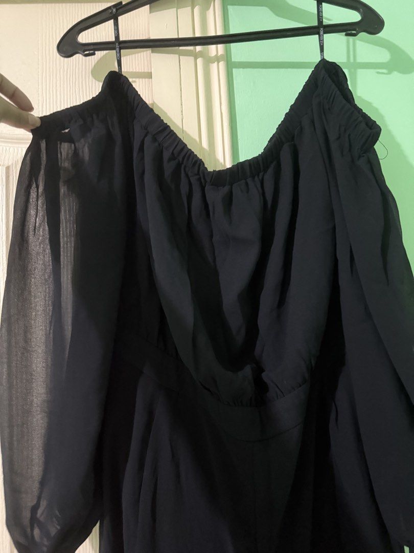 Forever 21 Black Off-Shoulder Chiffon Jumpsuit (Category: Jumpsuits) located in Manila. Submitted by ninnavanilla (Listing ID 1453585308, Image 2). Description: - Black off-shoulder jumpsuit - Brand: Forever 21+ - Material: Chiffon with flowy sleeves - Wide leg pants - Occasion: Perfect for night outs or special occasions - Style: Versatile, easy to dress up or down.