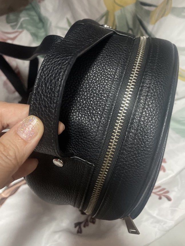 Furla Black Leather Backpack with Glitter Stars (Category: Backpacks) located in Pasig City. Submitted by treefairyapple (Listing ID 1453551269, Image 2). Description: - Cute Furla backpack in black pebbled leather - Features sparkly glitter star embellishments on the front - Zip closure - Interior zip pocket and Furla logo tag - Padded back with adjustable straps - Great for everyday use or a fun night out.