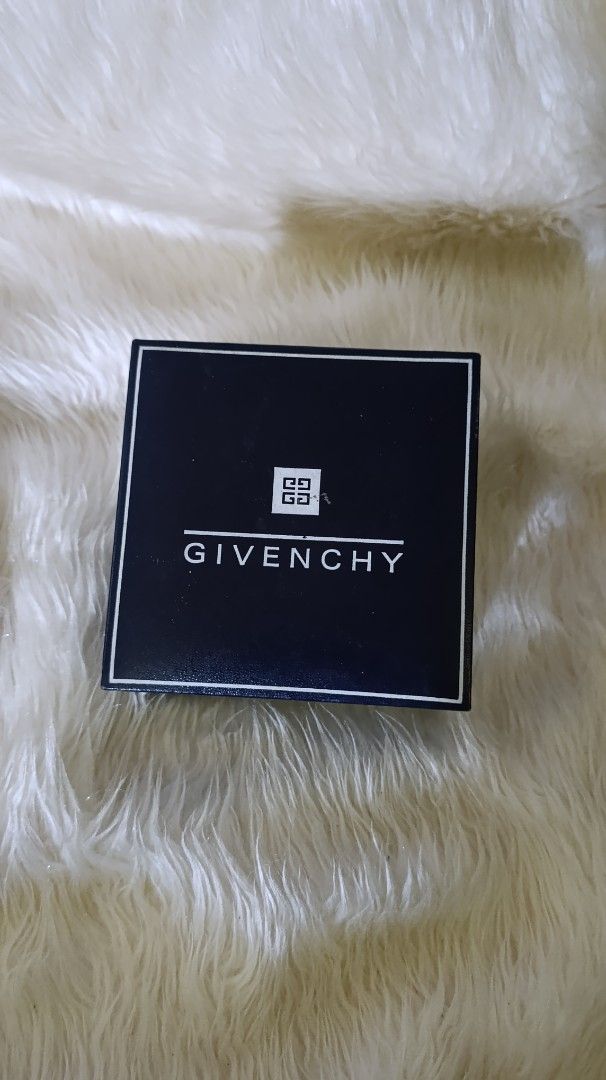 Givenchy Jewelry Box (Category: Accessory Holder, Box & Organizers) located in Gingoog City. Submitted by ThePurpleBox (Listing ID 1453439865, Image 1). Description: - Authentic Givenchy box - Color: Dark blue exterior with white Givenchy logo and emblem - Interior: Lined with white material - Perfect for storing small jewelry, trinkets, or as a gift.