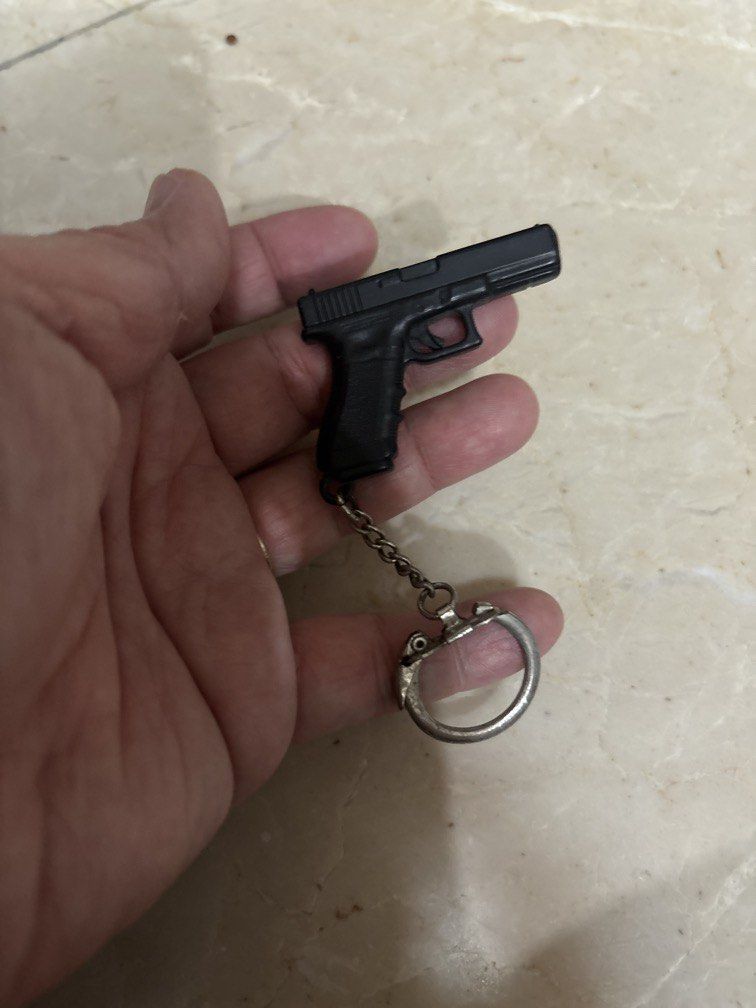 Glock keychain (Category: Character Goods) located in Manila. Submitted by vintageaccessories (Listing ID 1453443922, Image 1). Description: .