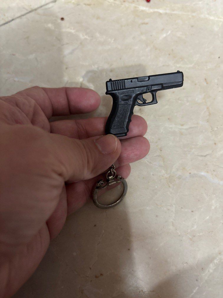 Glock keychain (Category: Character Goods) located in Manila. Submitted by vintageaccessories (Listing ID 1453443922, Image 2). Description: .