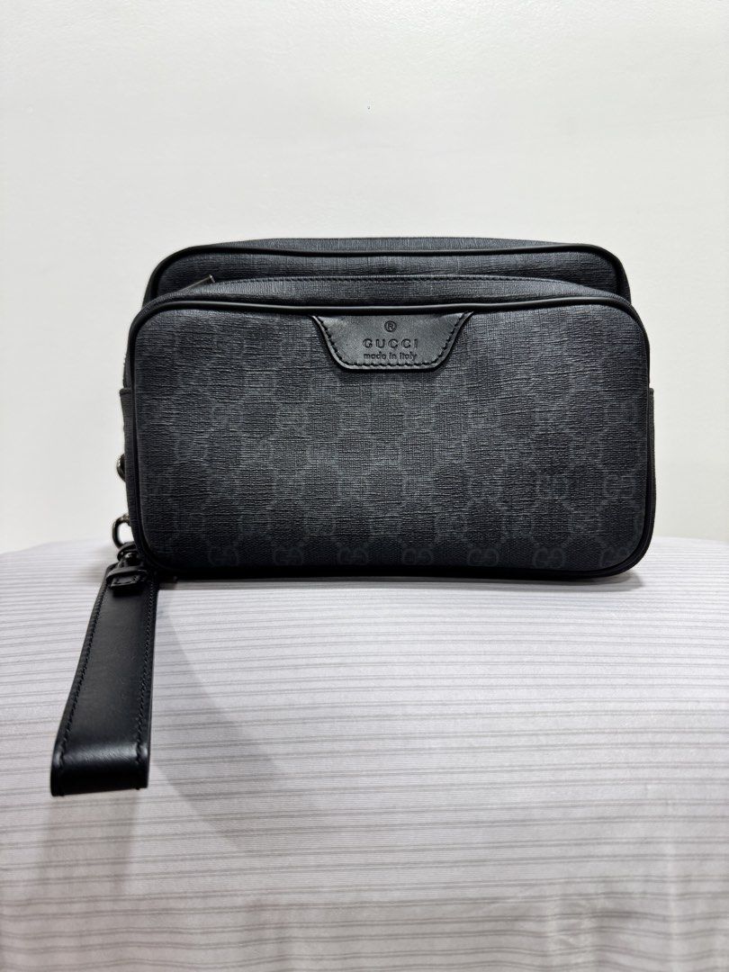 Gucci GG Supreme Pouch Black (Category: Luxury Bags & Wallets) located in Mandaluyong City. Submitted by rdangeles18 (Listing ID 1453511875, Image 1). Description: Gucci GG Supreme Clutch Bag Authentic. The bag is in good condition and ready for its next owner. Price is slightly negotiable for serious buyers. Transaction options: * Meet-up is preferred so you can personally inspect the item before purchasing. * Shipping is available via Lalamove 