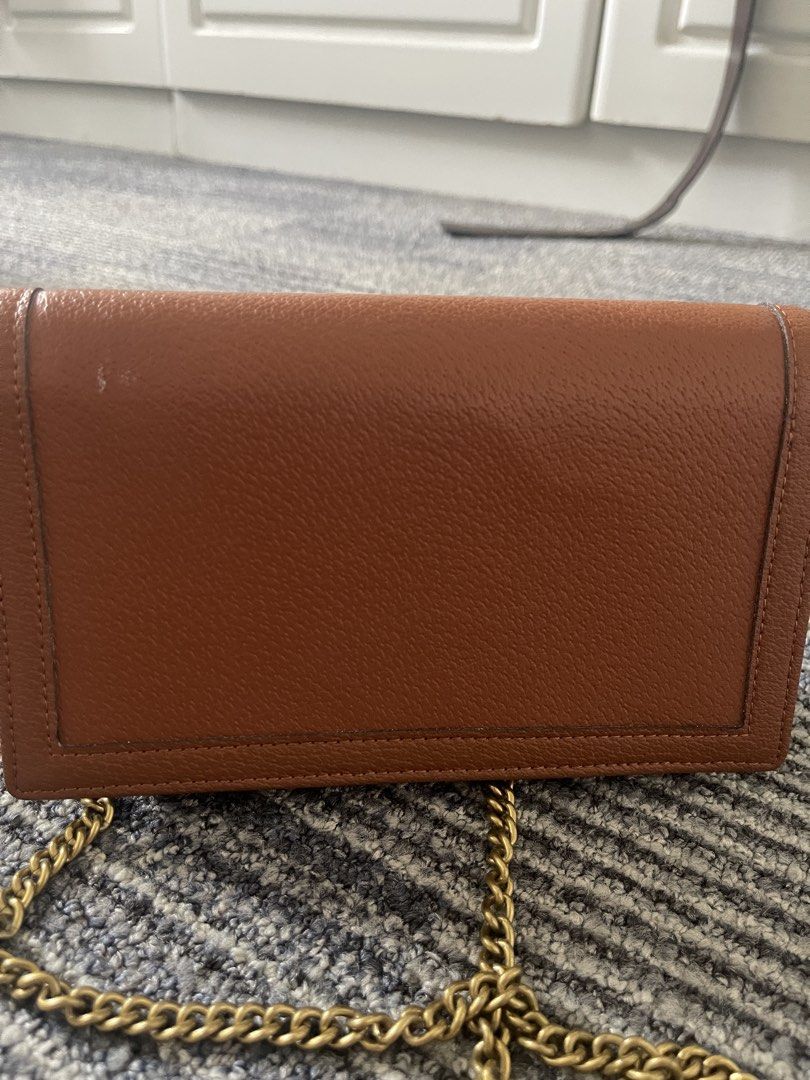 Gucci Marmont Wallet on Chain Brown Leather (Category: Luxury Bags & Wallets) located in Rizal. Submitted by annelimited_stuffs (Listing ID 1453561799, Image 3). Description: - Gucci wallet on chain - Features iconic GG logo and bamboo detail - Gold-tone hardware - Perfect for essentials - Can be worn as a crossbody or shoulder bag.