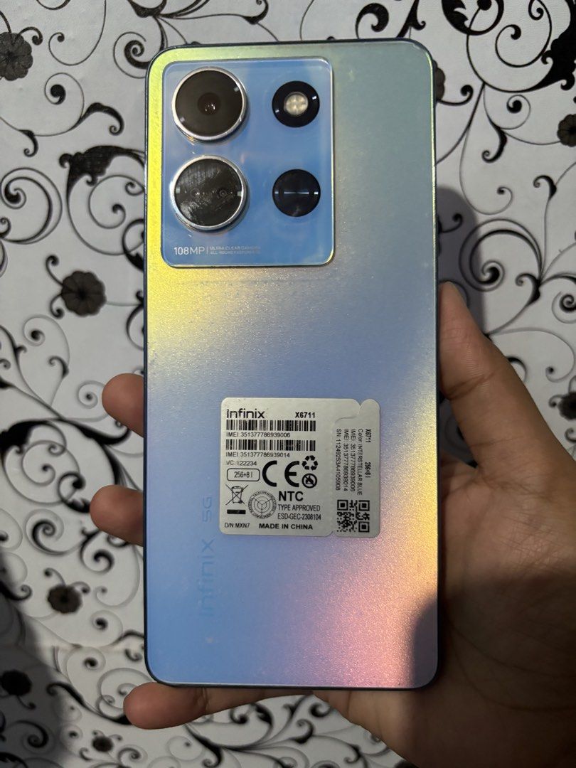 Infinix NOTE 30 5G (Category: Android Others) located in Manila. Submitted by cleverwind.b50216 (Listing ID 1453554955, Image 2). Description: Baka may gusto, pm po. Infinix Note 30 5G (8GB RAM / 256GB Storage). Selling my Infinix Note 30 5G in good condition. Specs: * 8GB RAM (+8GB Extended RAM) * 256GB Storage * 5G Ready * Android 14 * Dimensity 6080 Processor * 108MP Triple Camera * 16MP Front Camera * 5000mAh Battery Condition: * Good overall