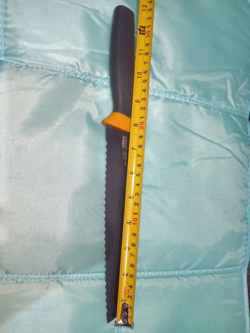 Joseph Joseph Serrated Bread Knife Stainless Steel (Category: Knives & Chopping Boards) located in Pasig City. Submitted by urdal01 (Listing ID 1453588629, Image 3). Description: - Joseph Joseph Bread Knife - Serrated stainless steel blade (approx. 8 inches) - Features a stylish orange handle accent - Perfect for slicing bread and pastries.