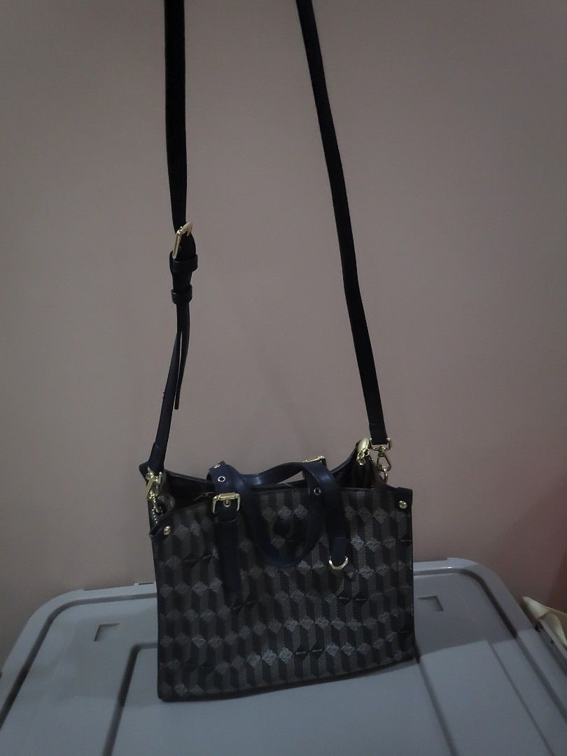 JOVANN Monogram Tote Bag with Shoulder Strap (Category: Luxury Bags & Wallets) located in Marikina City. Submitted by starbright101 (Listing ID 1453616739, Image 3). Description: - JOVANN monogram bag - Classic dark brown and beige pattern - Elegant gold hardware details - Features both top handles and a detachable shoulder strap - Secure zipper closure - Ample interior space, ideal for everyday essentials Leather straps are as good like new. No 
