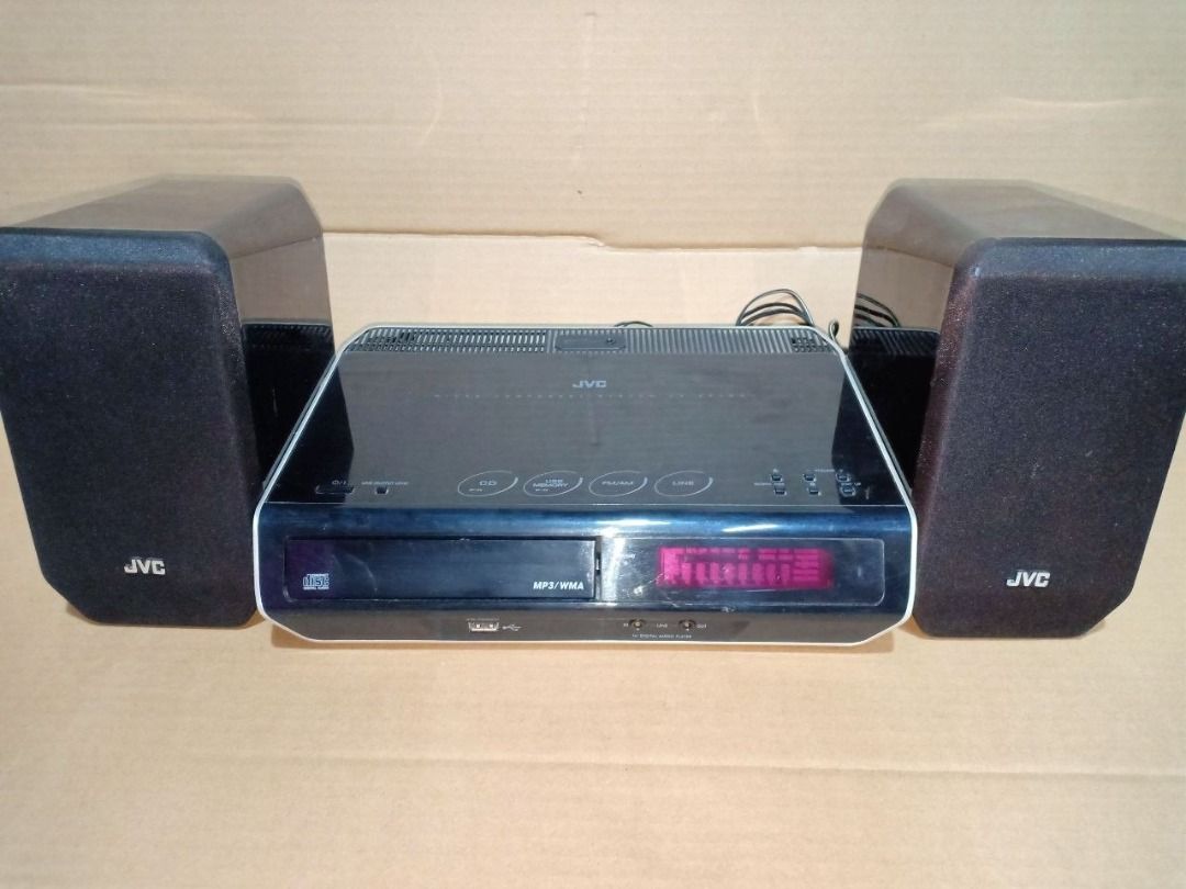 JVC Micro Component System UX-EP100 with ISSUE (Category: Soundbars, Speakers & Amplifiers) located in Bulacan. Submitted by ton0774 (Listing ID 1453606199, Image 1). Description: - JVC UX-EP100 Micro Component System *WITH ISSUE* No disc lumalabas kahit umiikot ang disk sa loob Yung aux line grounded my buzzing noise pero nawawala pag sinaksakan May small crack yung plastic body sa gilid and with sign of use and scratches radio ay okay speakers 