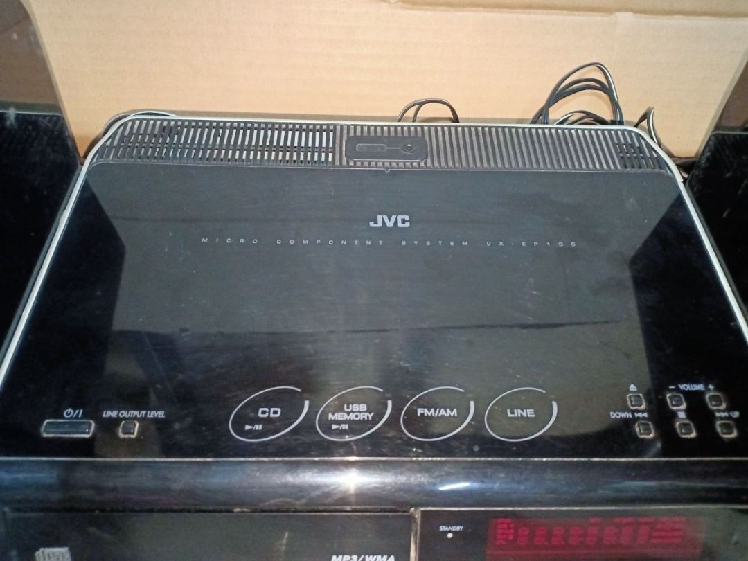 JVC Micro Component System UX-EP100 with ISSUE (Category: Soundbars, Speakers & Amplifiers) located in Bulacan. Submitted by ton0774 (Listing ID 1453606199, Image 3). Description: - JVC UX-EP100 Micro Component System *WITH ISSUE* No disc lumalabas kahit umiikot ang disk sa loob Yung aux line grounded my buzzing noise pero nawawala pag sinaksakan May small crack yung plastic body sa gilid and with sign of use and scratches radio ay okay speakers 