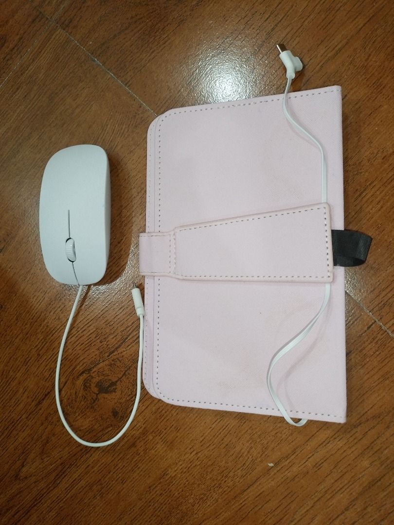 Keyboard and Mouse for Cellphones and Tablets (Category: Other Accessories) located in Bulacan. Submitted by jai.sthriftology (Listing ID 1453550319, Image 2). Description: Condition: It still works so well and smoothly when it's connected to the devices (the charging port (?) is 'TYPE C' by the way.) Issue/s: missing part to clamp the edges for mostly cellphones and slightly dirt on the leather cover due to old stickers Reason: decluttering 🗨️ 