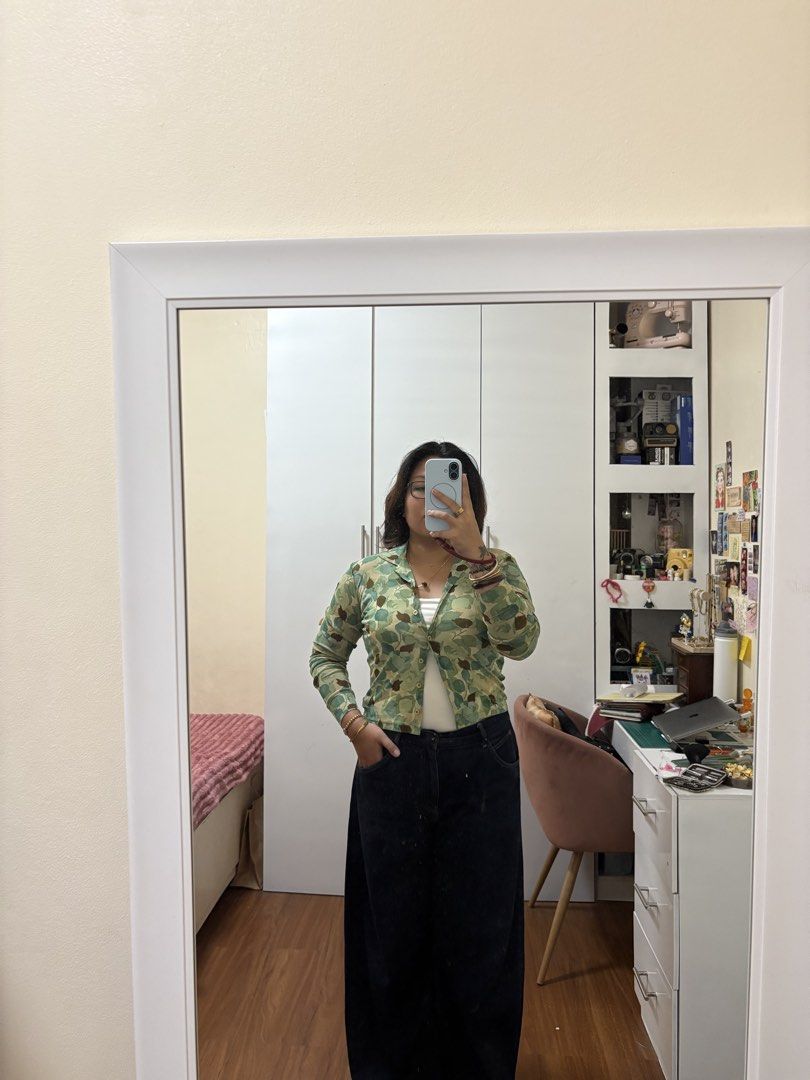 KOOKAI Floral Print Button-Up Shirt (Category: Longsleeves) located in Caloocan City. Submitted by kaycakes (Listing ID 1453524829, Image 1). Description: - Cute green and blue floral print cardigan - Long sleeves - Collared neckline - Button-up front - Versatile for casual or dressy looks - Size 2.