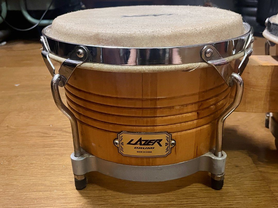 Lazer Music 8" & 9" Bongo Set (Category: Musical Instruments) located in Manila. Submitted by alinivera (Listing ID 1453548338, Image 3). Description: 8 and 9 inch drum heads Maple wood with chrome hardware Lightly used Original price Php 5445 on Lazer Music website .
