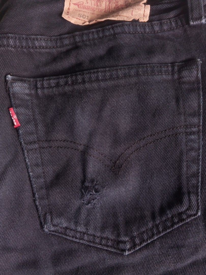 Levi's 501 Black Denim Jeans (Category: Jeans) located in Cabuyao City. Submitted by daleskiee (Listing ID 1453526001, Image 3). Description: size : w 34 - l 36 issue: see pics preloved not ukay - Classic Levi's 501 jeans - Color: Black - Fit: Straight leg - Condition: Some fraying at hem, small distressed spot on back pocket. Plenty of life left. - Style: Great staple piece for any wardrobe..