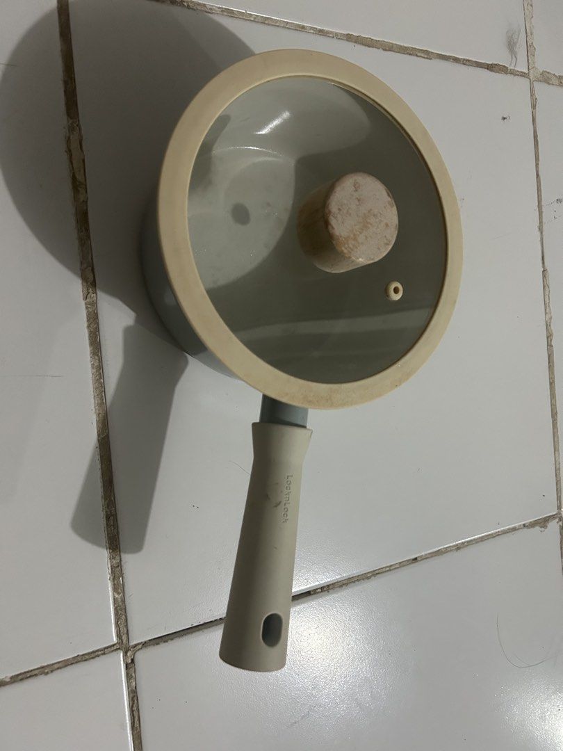 LocknLock Induction Compatible Saucepan with Glass Lid (Category: Cookware & Accessories) located in Angeles City. Submitted by kimkant06043026 (Listing ID 1453620570, Image 3). Description: - LocknLock saucepan with glass lid - Features a wooden knob on the lid - Induction cooktop compatible bottom - Ideal for heating sauces or small portions - Ergonomic handle for comfortable grip - Minor signs of use on the inside - Sold as is.