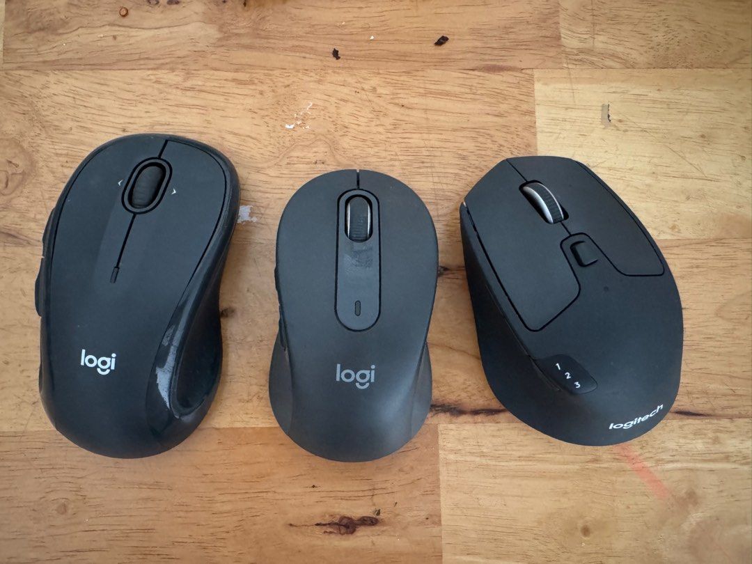Logitech Wireless mouse (Category: Mouse & Mousepads) located in Singapore. Submitted by dahren (Listing ID 1453434396, Image 1). Description: - Selling Logitech wireless mouse - come with the USB unifying connector Mouse(right most) - like new. includes extra side buttons and an advanced scroll wheel.