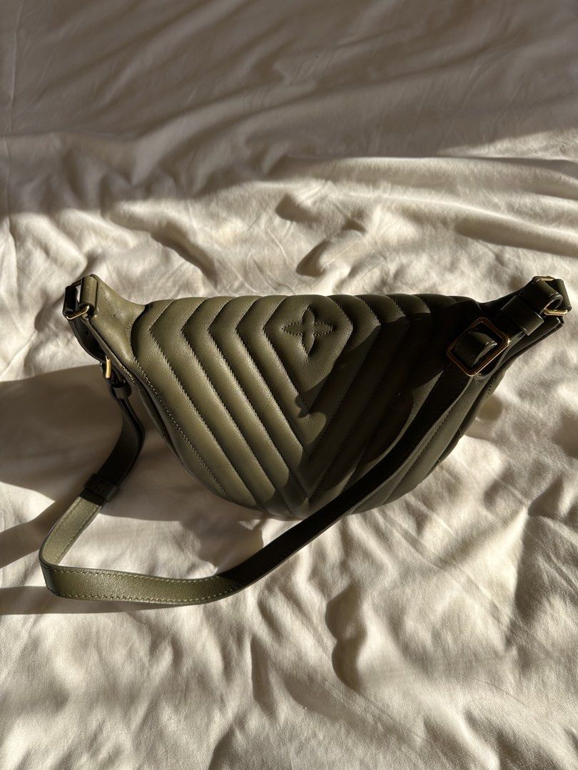 Louis Vuitton New Wave Bum Bag (Category: Luxury Bags & Wallets) located in Quezon City. Submitted by zesthiria (Listing ID 1453514844, Image 3). Description: Khaki green Louis Vuitton belt bag with quilted chevron pattern Authentic with dust bag and original box. RFS: No longer used, selling for my mom! 😊 Feel free to message for pictures and videos/videocall. .