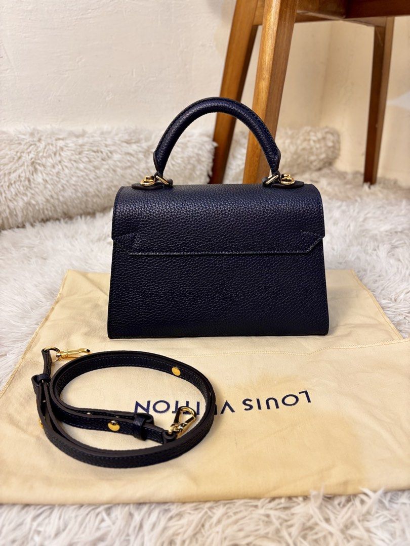 Louis Vuitton Twist One Handle Bag (Category: Luxury Bags & Wallets) located in Muntinlupa City. Submitted by yang2nd (Listing ID 1453591845, Image 2). Description: ✔️coded ▪️color: Navy ▪️message for more info and details.