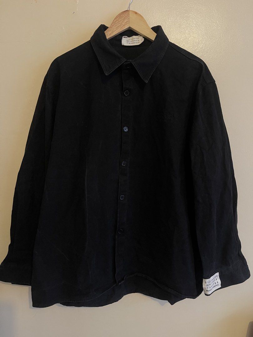 Maison Margiela Black Oversized Buttondown Longsleeve (Category: Tshirts & Polo Shirts ) located in Gingoog City. Submitted by matcha.archive (Listing ID 1453531569, Image 2). Description: Size: Best fit 2XL Width: 25 Length: 30 Color rate: 9/10 Condition: Excellent Issue: need deep wash (white stains) *Plus shipping fee* *Color may vary due to lighting* *Authenticity not guarantee*.