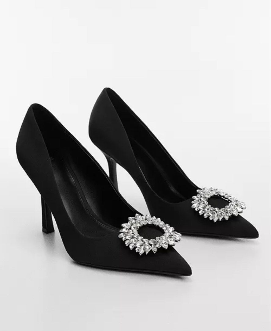 Mango Black Satin Heels with Crystal Embellishment (Category: Heels) located in Cainta. Submitted by erraticgal (Listing ID 1453490752, Image 2). Description: - Brand: Mango - Color: Black - Material: Satin - Style: Pointed-toe heels - Embellishment: Sparkly crystal on the front - Heel type: Classic stiletto - Occasion: Perfect for dressing up outfits, parties, or a night out. *USED ONLY ONCE (Graduation) Original price: 4,200 UK 6 .