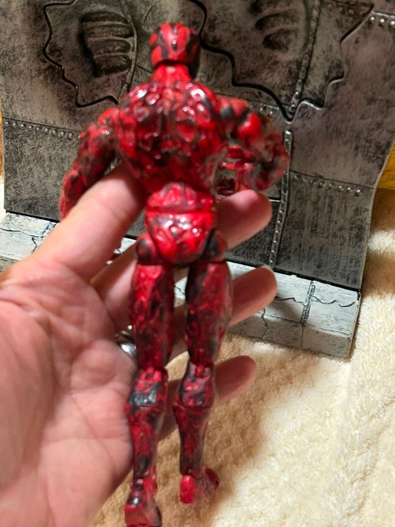 Marvel Carnage Action Figure Toy (Category: Figurines & Statues) located in Las Pinas. Submitted by whatzupriley (Listing ID 1453542151, Image 2). Description: - Carnage action figure - Red and black color scheme - Small scuff mark present on the left foot - Ideal for collectors and fans of the character has glued arm.
