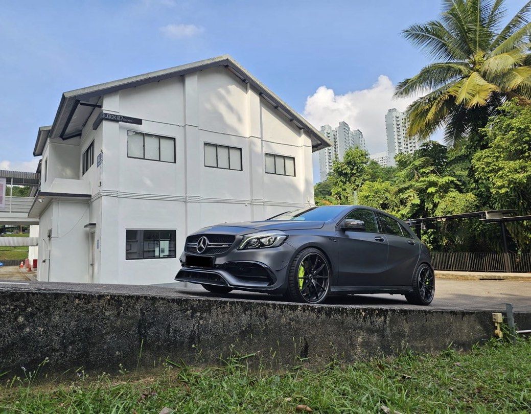 Mercedes-Benz A-Class A45 AMG (A) (Category: Used Cars) located in Singapore. Submitted by omgedwin (Listing ID 1453485094, Image 3). Description: - Powered by an AMG hand built 2.0L turbocharged engine - Stage one tuned producing 410bhp with 550nm of torque - 7 speed AMG speed shift DCT - Electric memory seats - AMG exclusive designo Selenite Grey Magno paintwork - Carbon fibre bonnet with subtle CF upgrades - 19 Inch Rays VR Rims with PS4S tire