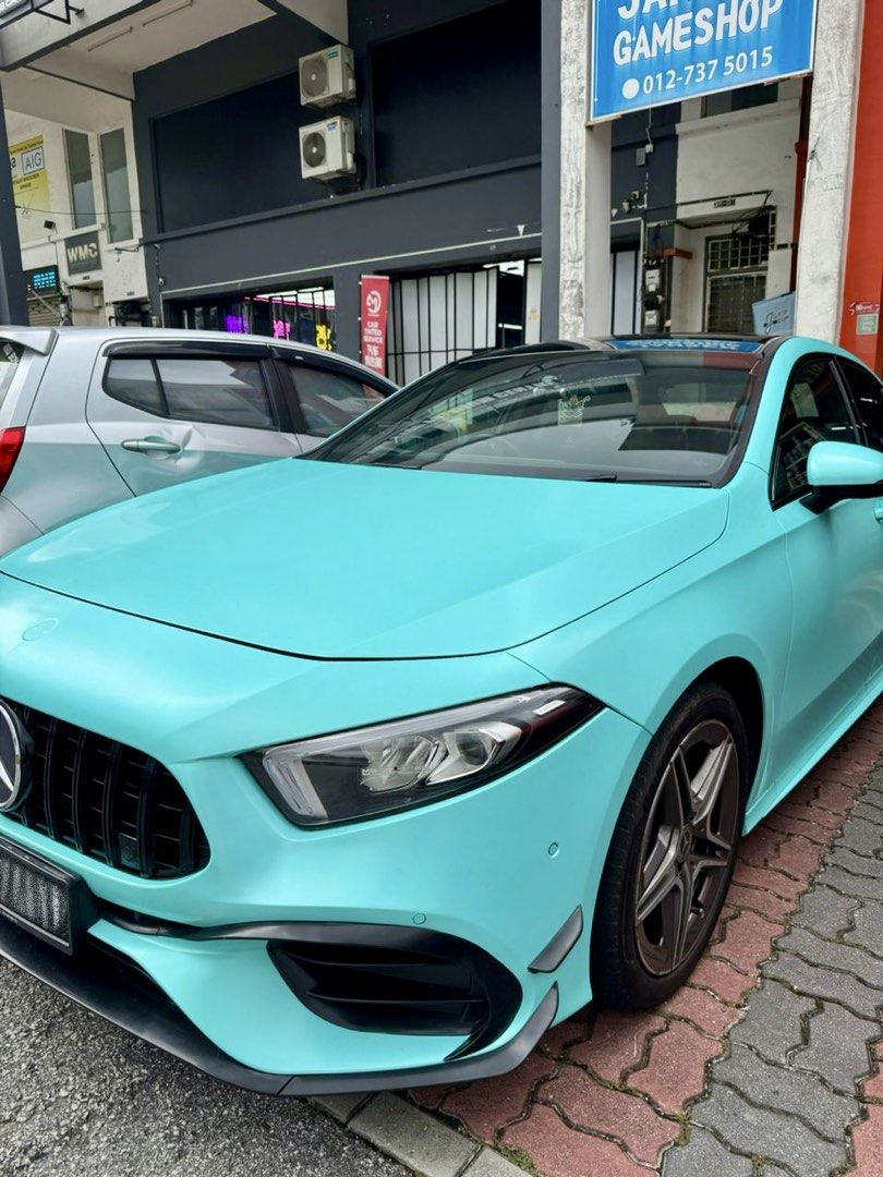 Mercedes-Benz A-Class Saloon A200 Progressive (A) (Category: Used Cars) located in Singapore. Submitted by Kenny_Lee92 (Listing ID 1453550849, Image 2). Description: 1️⃣ Accident free, pristine condition and well maintained. 2️⃣ Newly wrapped in Tiffany Blue PET wrap in Apr 2026 + gloss black dechromed roof and window trim. 3️⃣ Full A45S Body kit. 4️⃣ Major maintenance worth $3.5k completed at 79,513 km (gearbox oil leak repair, new gearbox oil, 